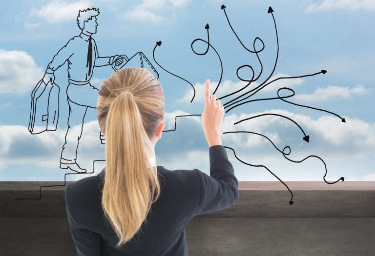 Composite image of blonde businesswoman pointing somewhere